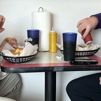 Eddie's Sandwich Shop - Guys indulging in bologna and hamburger sandwiches. - Sandwiches Near Me - Brazil, Indiana Eddie's Sandwich Shop - Guys indulging in bologna and hamburger sandwiches. - Sandwiches Near Me - Brazil, Indiana