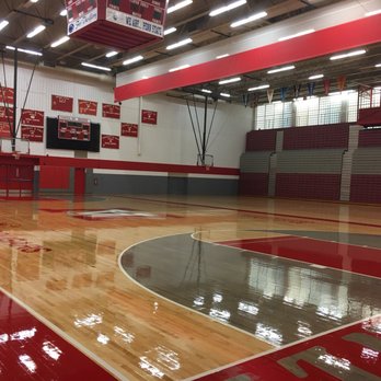 Mastercraft Sports Flooring - Finished product after just sanding main court. Stain and painted. - Flooring Near Me
