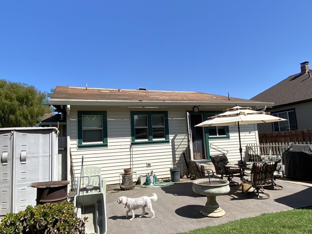 Slide of Urrutia Roofing