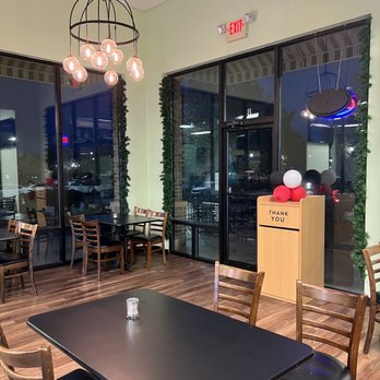 The Chefs Delight - a table and chairs in a restaurant - Seafood Near Me - Eatonton, Georgia The Chefs Delight - a table and chairs in a restaurant - Seafood Near Me - Eatonton, Georgia