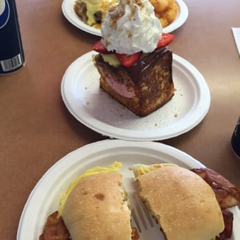 Button Up Cafe - Bacon breakfast sandwich, strawberry French toast, & Kali's pig eggs Benedict with taters. - Breakfast & Brunch Near Me - Pearl City, Hawaii Button Up Cafe - Bacon breakfast sandwich, strawberry French toast, & Kali's pig eggs Benedict with taters. - Breakfast & Brunch Near Me - Pearl City, Hawaii