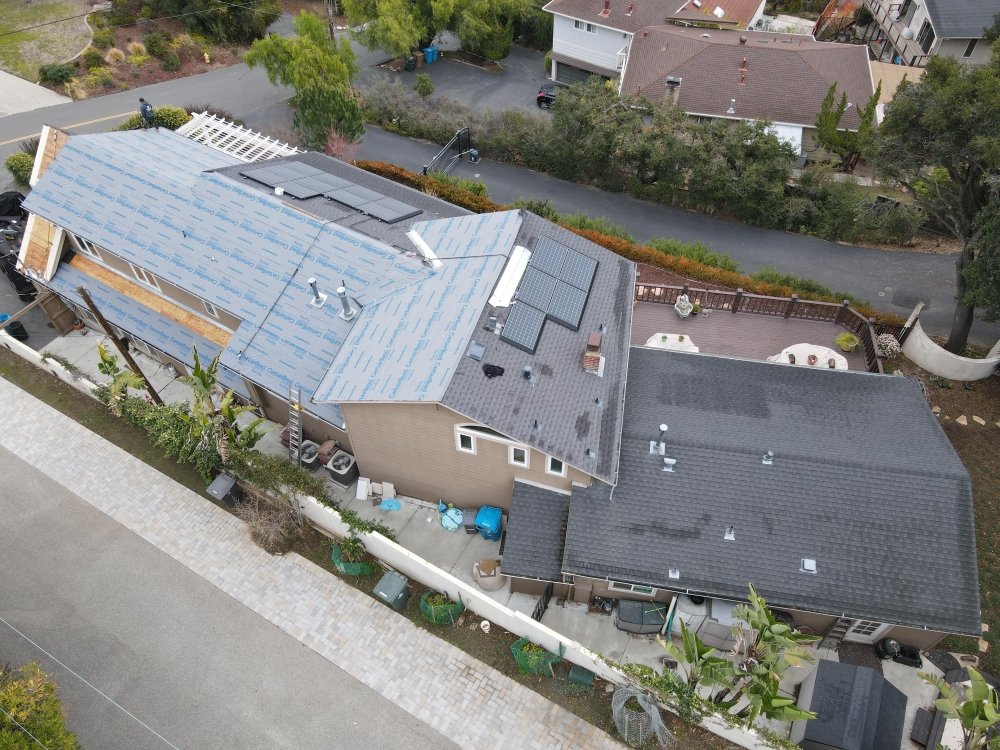 Slide of Real Roofing