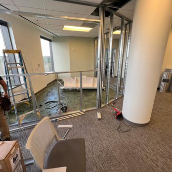 G&R Construction - a man standing in a room with glass walls - Handyman Near Me - Peachtree Corners, Georgia G&R Construction - a man standing in a room with glass walls - Handyman Near Me - Peachtree Corners, Georgia