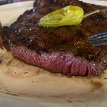 Babb Bar Cattle Baron Supper Club - Bob's specialty ribeye medium rare with bone in - Seafood Near Me - Babb, Montana Babb Bar Cattle Baron Supper Club - Bob's specialty ribeye medium rare with bone in - Seafood Near Me - Babb, Montana