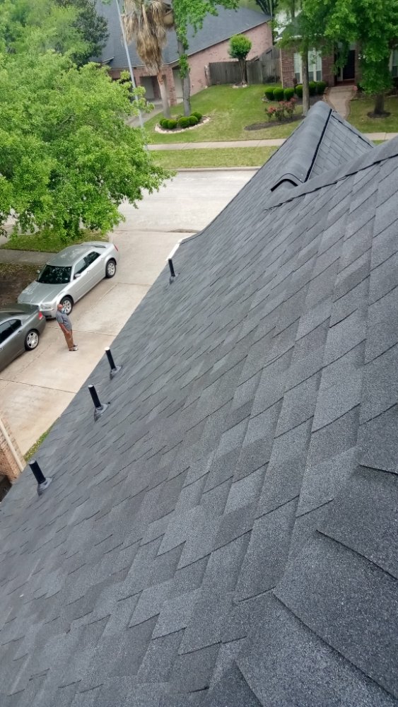 Slide of Refined Roofing & Construction