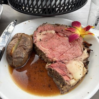 Pub On The Green - Queen-cut Prime Rib with Baked Potato - Cocktail Bars Near Me - Ontario, New York Pub On The Green - Queen-cut Prime Rib with Baked Potato - Cocktail Bars Near Me - Ontario, New York
