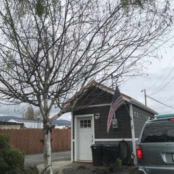 NW Coffee - a car parked in front of a garage - Coffee & Tea Near Me - Port Angeles, Washington NW Coffee - a car parked in front of a garage - Coffee & Tea Near Me - Port Angeles, Washington