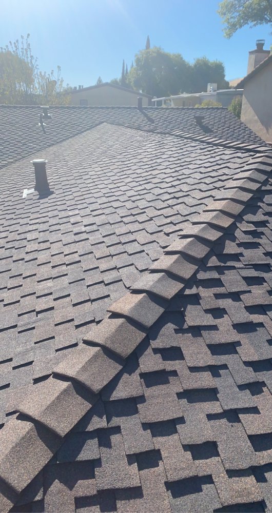 Slide of Aguilar Roofing