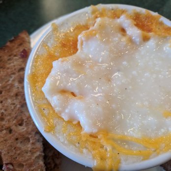 Metro Diner - Another picture of the cheesiest grits... You can see the cheese only consists of a small layer on top of plain grits - American Near Me - Matthews, North Carolina Metro Diner - Another picture of the cheesiest grits... You can see the cheese only consists of a small layer on top of plain grits - American Near Me - Matthews, North Carolina