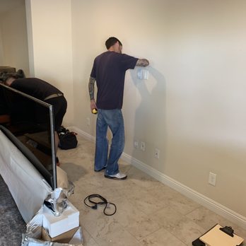 Wright AV - Justin taking measurements - Home Theatre Installation Near Me Wright AV - Justin taking measurements - Home Theatre Installation Near Me