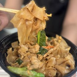 Pad See Ew from Pika Thai Bites -- wide rice noodles stir-fried with egg and Chinese broccoli, rich and savory.