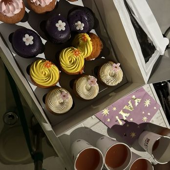 Sugarlina Bakeshop - A dozen cupcakes to go including ube and guava. So good! Perfect for our bday cheers and dessert on the sailboat. - Bakeries Near Me - Honolulu, Hawaii