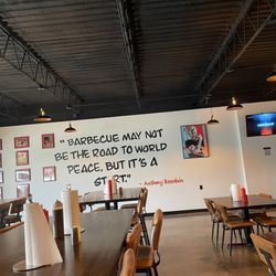 Knight Fire BBQ - Nice saying on wall and high top tables