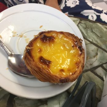 Beira Mar Breakfast & Lunch - a pastry on a plate with a spoon - Coffee & Tea Near Me - New Bedford, Massachusetts Beira Mar Breakfast & Lunch - a pastry on a plate with a spoon - Coffee & Tea Near Me - New Bedford, Massachusetts