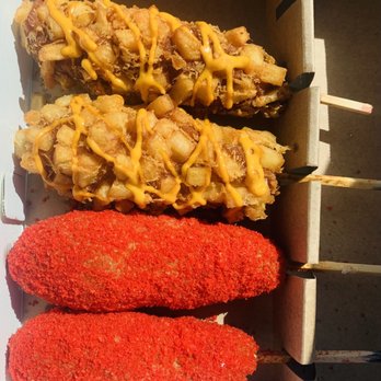 Mochinut - Half and half potatoes corndogs, and half and half hot Cheetos corn dogs. - Donuts Near Me - Peoria, Arizona Mochinut - Half and half potatoes corndogs, and half and half hot Cheetos corn dogs. - Donuts Near Me - Peoria, Arizona