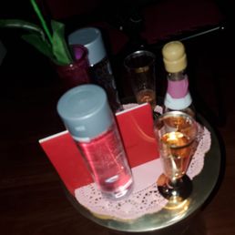 Table service up with anniversary card I brought for my husband and water, and champagne.