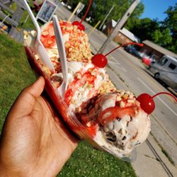 Simply Scoops - Banana split $7.45 I asked for the whip cream on the side for my dog. 3 scoops and sauces of your choice and 3 cherries!!!
