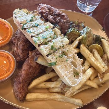 Urban Plates - 3 Tenders, fries, Brussels sprouts - New American Near Me - Carlsbad, California Urban Plates - 3 Tenders, fries, Brussels sprouts - New American Near Me - Carlsbad, California