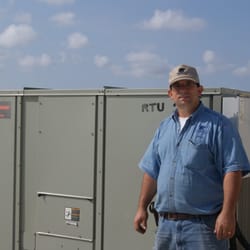 Torocco's Cooling & Heating - Mark Torocco Working on a Commercial Air Conditioning Unit in Fort Myers, FL