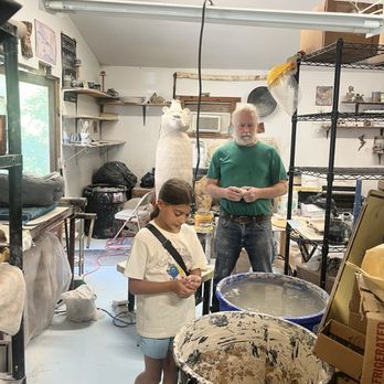 Smoke in the Mountains Pottery - Rob giving our girls a tour of his work area. - Art Classes Near Me - Brasstown, North Carolina Smoke in the Mountains Pottery - Rob giving our girls a tour of his work area. - Art Classes Near Me - Brasstown, North Carolina
