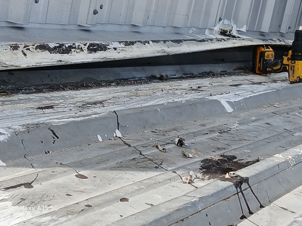 Slide of Mark Roofing Construction