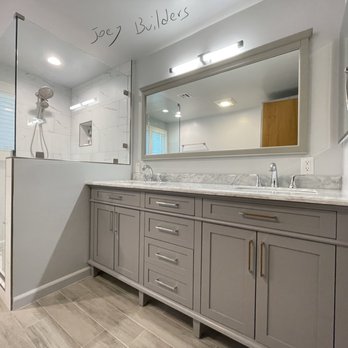 Joey Remodeler - a bathroom with two sinks and a shower - General Contractors Near Me - Long Beach, California Joey Remodeler - a bathroom with two sinks and a shower - General Contractors Near Me - Long Beach, California