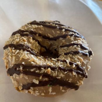 Solid Coffee Roasters - Vegan Donut (caramel with coconut flakes and chocolate drizzle) - Coffee Roasteries Near Me - Artesia, California Solid Coffee Roasters - Vegan Donut (caramel with coconut flakes and chocolate drizzle) - Coffee Roasteries Near Me - Artesia, California