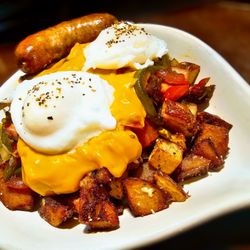 Our Breakfast Skillet with Aged Cheddar Cheese Sauce and Link Sausage