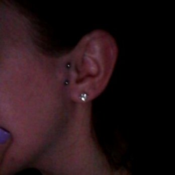 Exodus Ink - Surface vertical tragus - Tattoo Near Me - Summit, Illinois