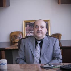 Adnan Khazaal, DDS - Dental Art Clinic - America's Top Dentist reward, specializing in Cosmetic Dentistry, Implants, and braces