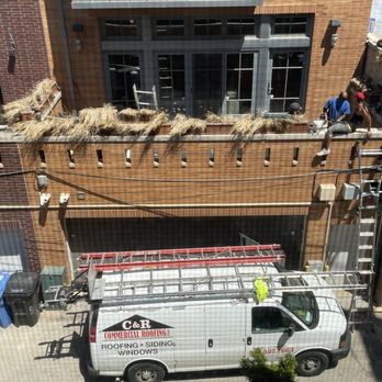 C&R Commercial Roofing - blocking the alley so no one can get in or out of their garages. Won't move. - Roofing Near Me - Wheeling, Illinois