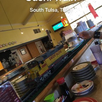 Sushi Train - Train and plates stacked up from what we're already picked out! - Sushi Bars Near Me - Tulsa, Oklahoma Sushi Train - Train and plates stacked up from what we're already picked out! - Sushi Bars Near Me - Tulsa, Oklahoma