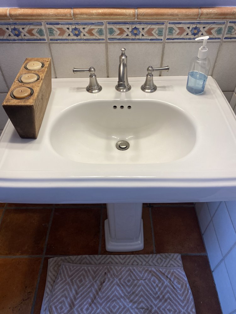 Slide of The in and out plumbing guy