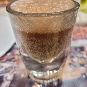 2nd Ave Deli - End of meal complementary chocolate soda shot - Kosher Near Me - New York, New York