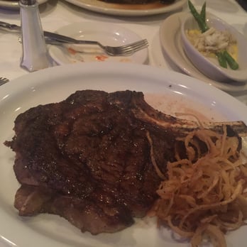 Bascom's Chop House - Bone in ribeye! And I love the addition of fried onions =P - Steakhouses Near Me - Clearwater, Florida