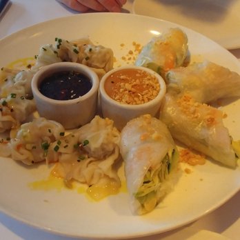 Cafe Minh - Spring rolls (right) and steamed beggar purses (left) - Asian Fusion Near Me - New Orleans, Louisiana Cafe Minh - Spring rolls (right) and steamed beggar purses (left) - Asian Fusion Near Me - New Orleans, Louisiana