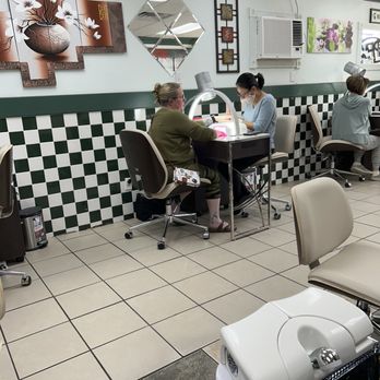 A+ Nail - Spa - Manicure area. This is the tech that took care of two people at the same time a few minutes after this pic was taken - Nail Salons Near Me - Okemos, Michigan