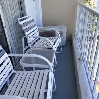Oasis Hotel Waikiki - Patio furniture. The big box kicks on and is very loud and annoying. - Hotels Near Me - Honolulu, Hawaii