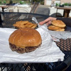 Little Town & Country Restaurant - Half pound cheeseburger w/onion rings And the Cod Fish Sandwich. It was delicious.
