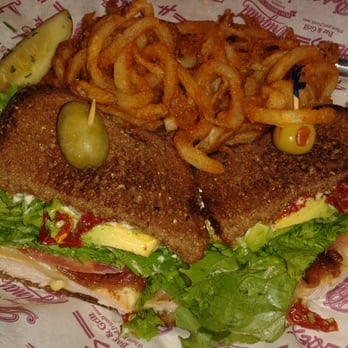 Heroes - Highlander Chicken Sandwich on Squaw brd. Bacon Avocado Pesto Mayo sundried tomato fresh tomato lettuce jack chz curlyfrys 12$ - American Near Me - Riverside, California