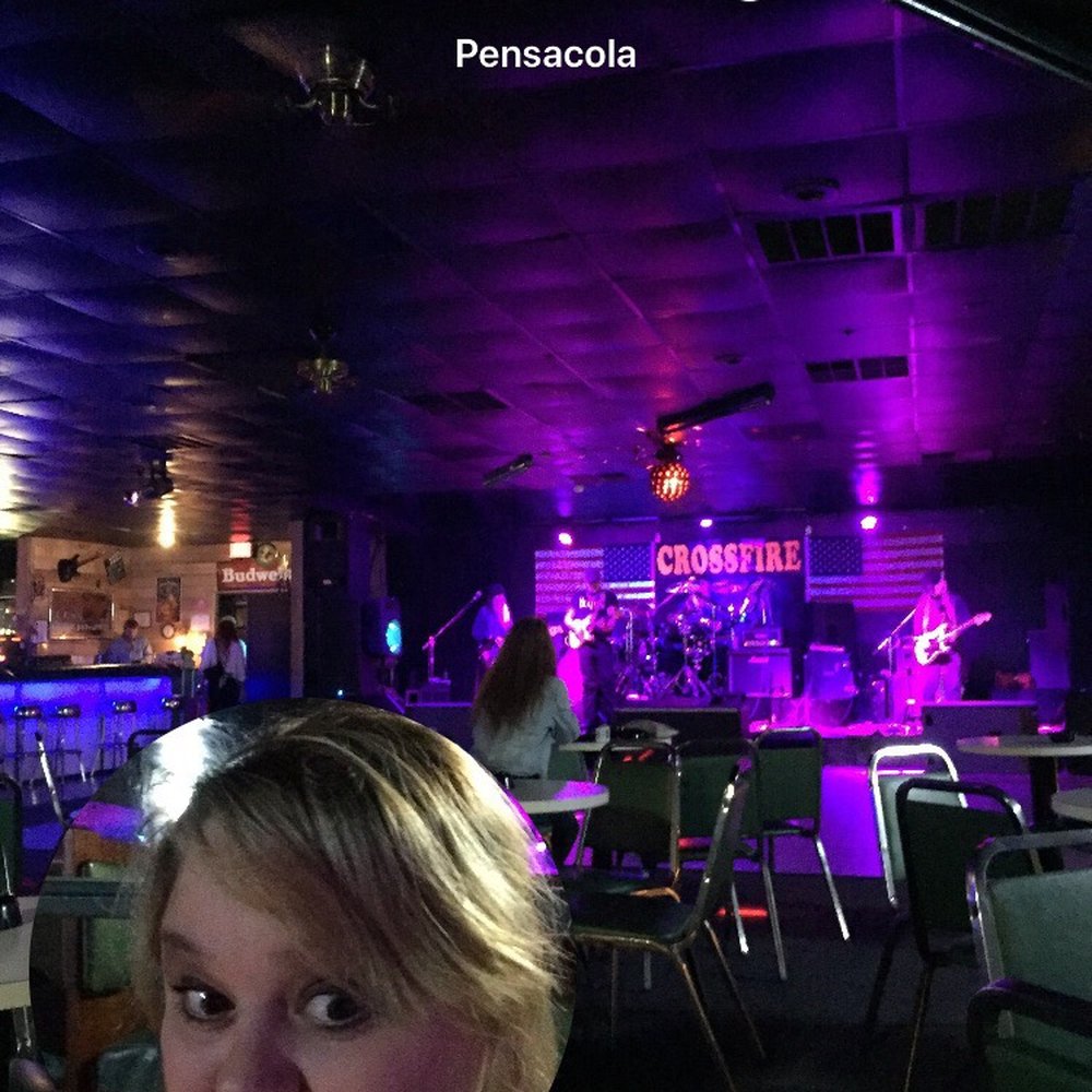 Gene's Lounge - a woman sitting at a table - Dance Clubs Near Me - Pensacola, Florida Gene's Lounge - a woman sitting at a table - Dance Clubs Near Me - Pensacola, Florida