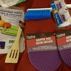 Dollar Tree - Pencils for genealogy notes, brush and spatula for sweeping debris off gravestones, cutting board for room, grippers because they're purple.