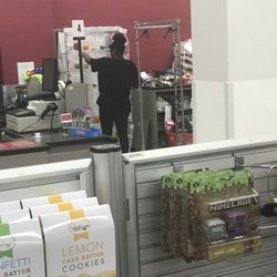 Burlington Coat Factory Warehouse - Sales rep not doing anything to serve the line of 30+ customers waiting.