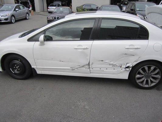 Photo of Michael J's Body Shop - San Jose, CA, US. 2008 Honda Civic Si that had a run in with a big rig.