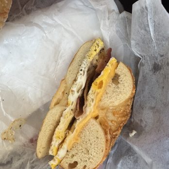 Bruegger's Bagels - Egg, Peppered Bacon & Cheese on an Asiago bagel with an extra egg - Bagels Near Me - Rochester, New York Bruegger's Bagels - Egg, Peppered Bacon & Cheese on an Asiago bagel with an extra egg - Bagels Near Me - Rochester, New York