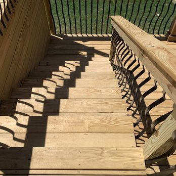 Salazar Express Service - a wooden deck with railings - General Contractors Near Me Salazar Express Service - a wooden deck with railings - General Contractors Near Me