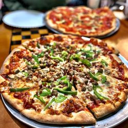 Tony's New York Pizza - Breakfast bacon, Ground meat, and green peppers.