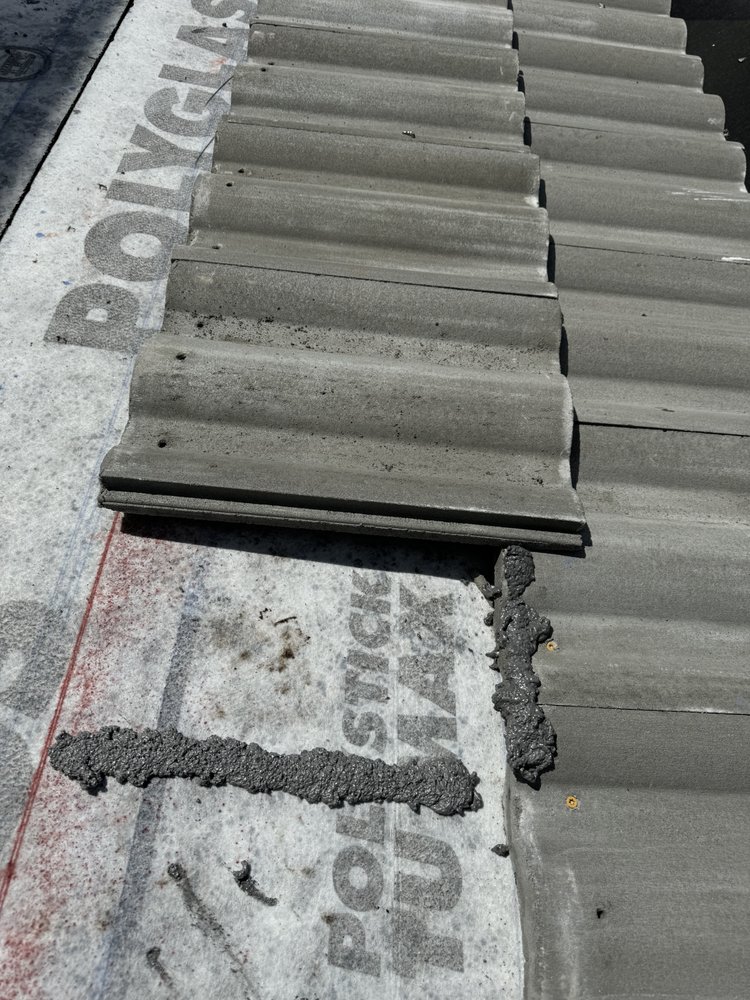 Slide of On Point Roofing