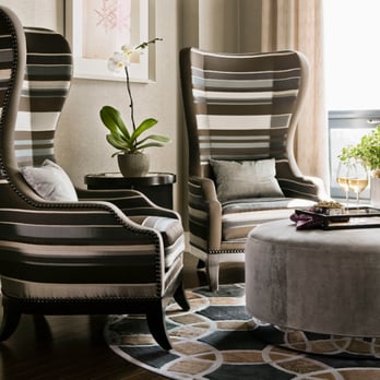 Graham's & Son Interiors - a living room with striped chairs - Shades & Blinds Near Me - Cambridge, Ontario