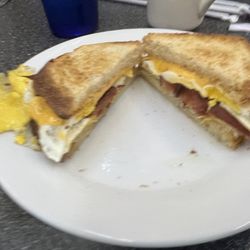 Karen's Kitchen - Breakfast sandwich with bacon, eggs and cheese on sourdough.